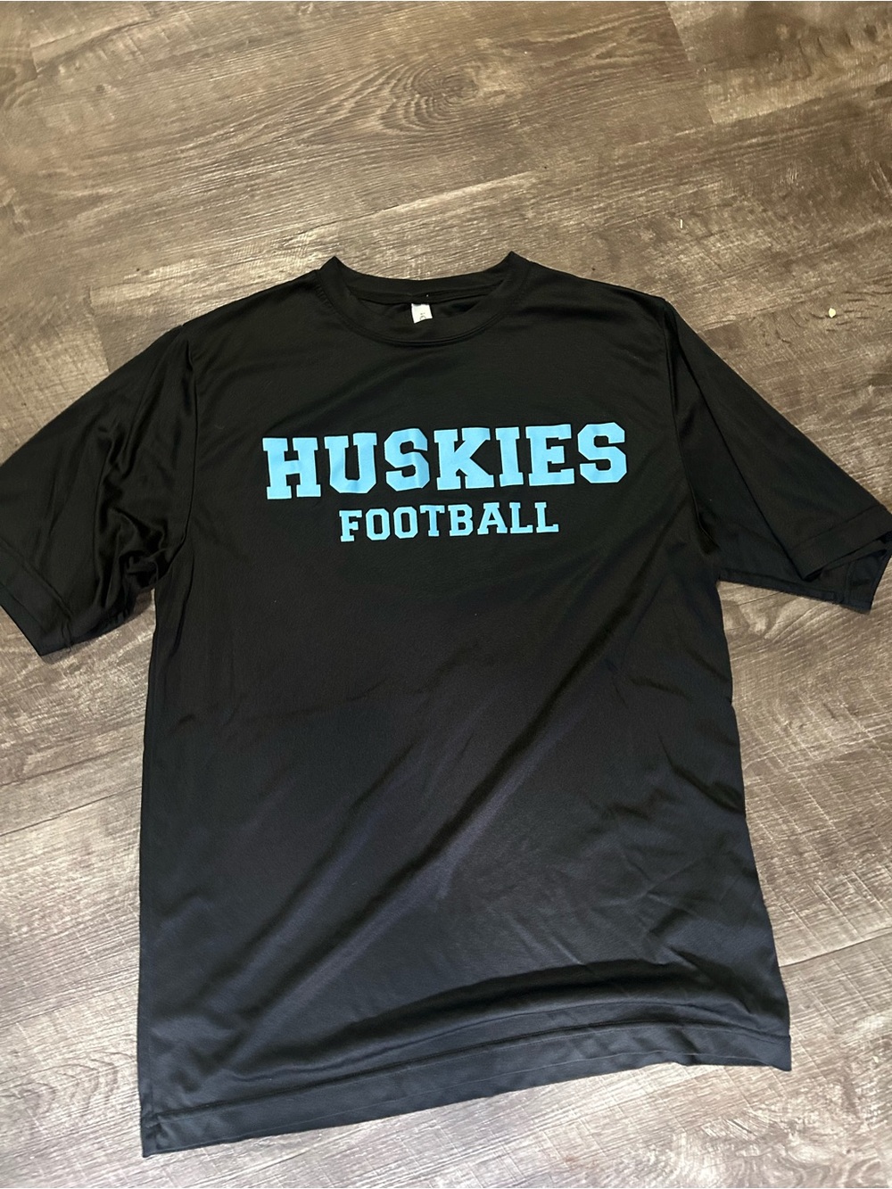 Huskies Football Black Short-Sleeve Tee with Light Blue Lettering